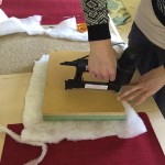 Position the cushioning in place